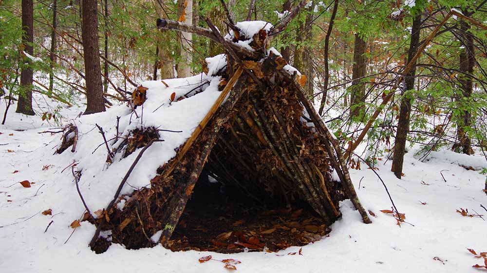 How To Build A Survival Winter Shelter To Get You Through the Night
